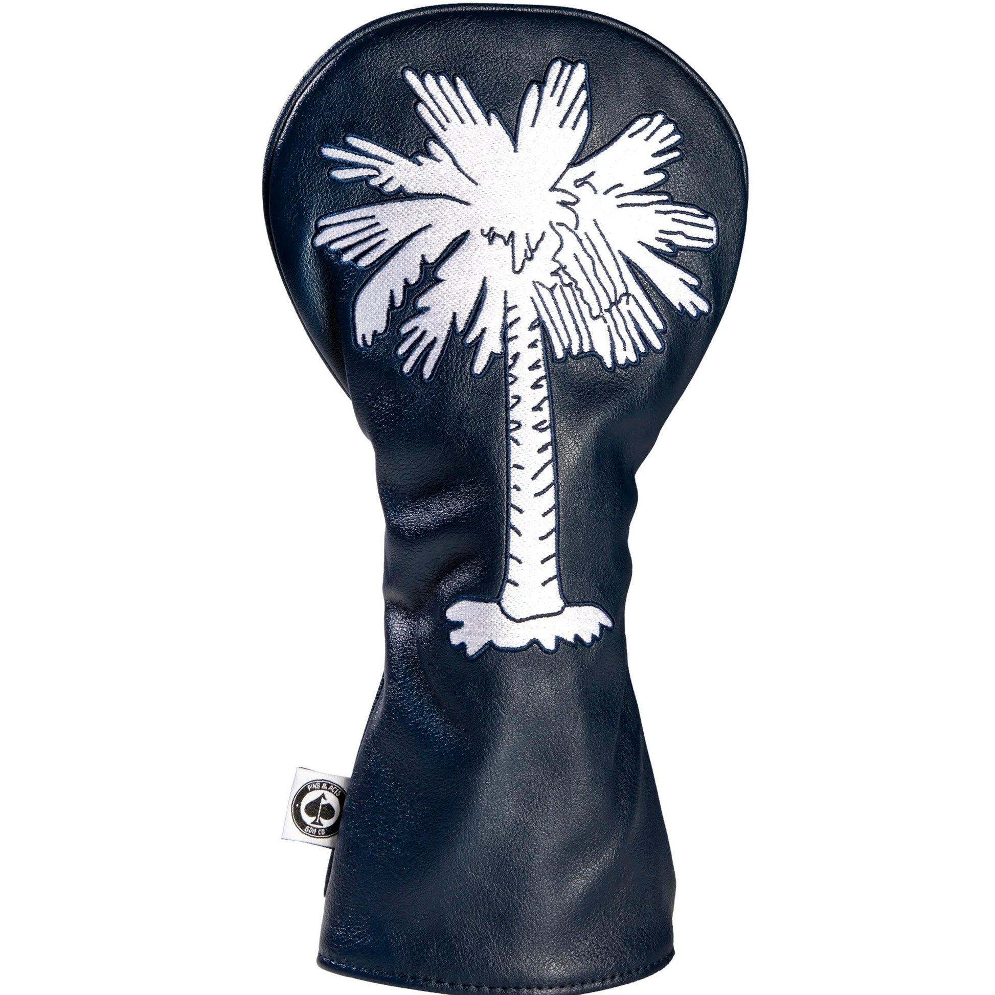 Golf club head cover with white palm tree design on a black background